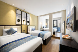 Hutong Garden View Quadruple Room with One Double Bed and Two Single Beds and Balcony