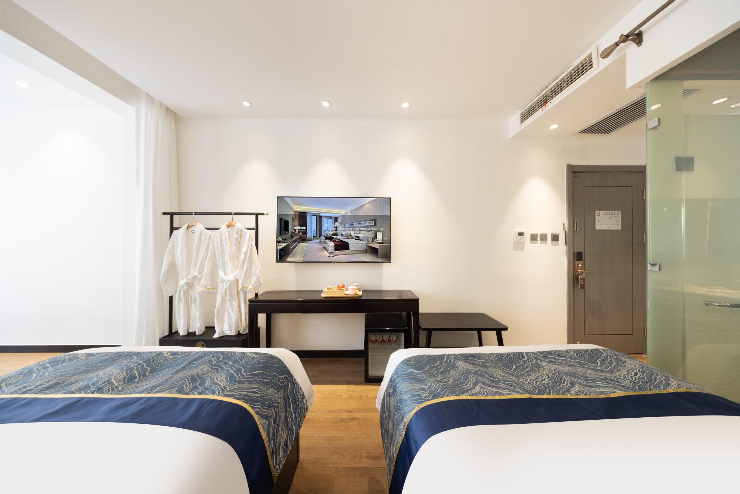 Hutong Garden View Quadruple Room with One Double Bed and Two Single Beds and Balcony - Image 4