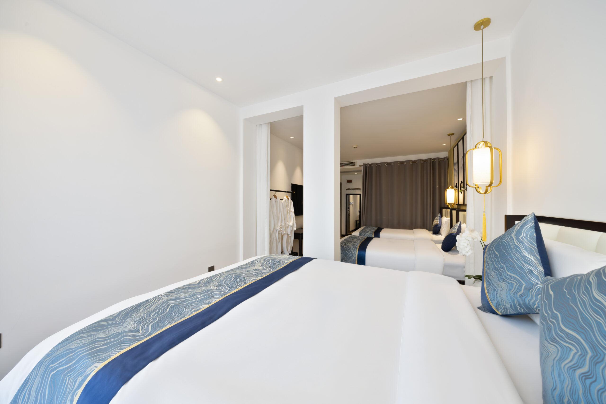 Hutong Garden View Quadruple Room with One Double Bed and Two Single Beds and Balcony - Image 3