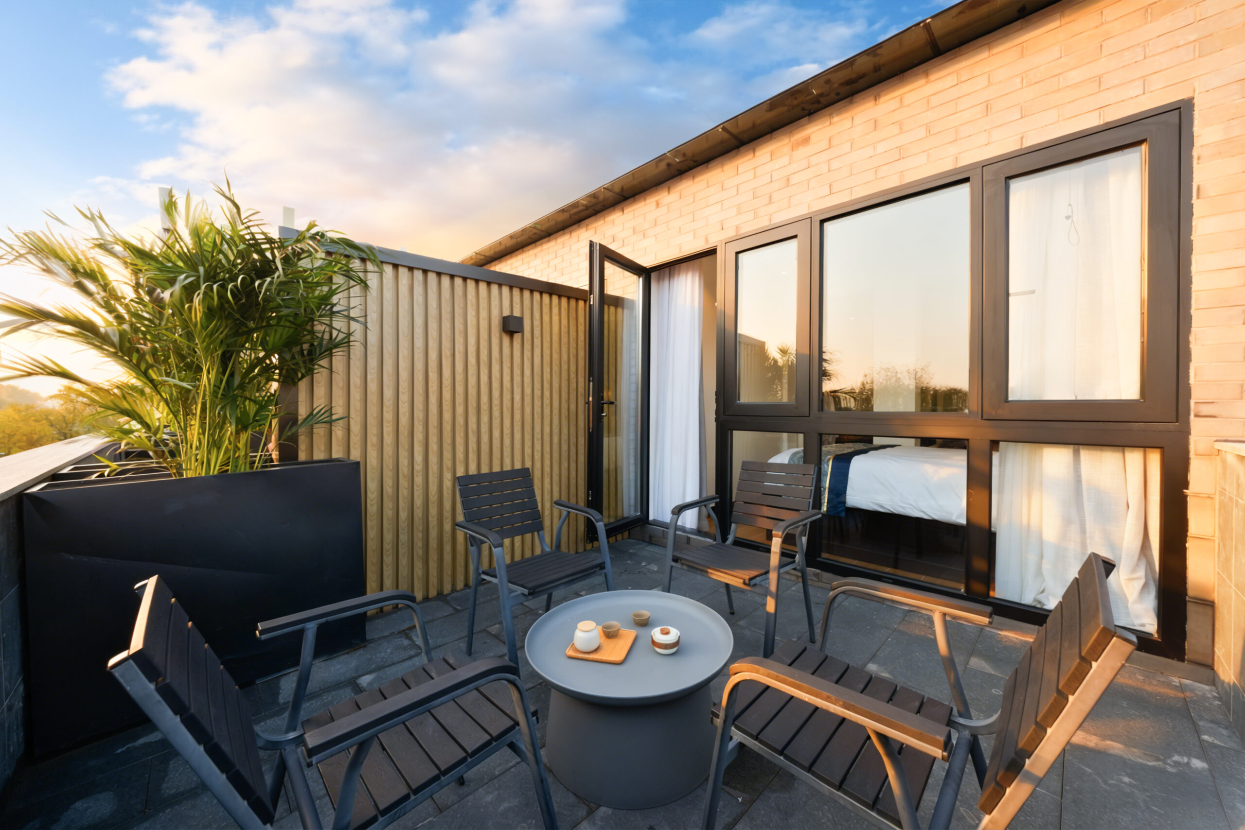 Hutong Garden View Quadruple Room with One Double Bed and Two Single Beds and Balcony - Image 2