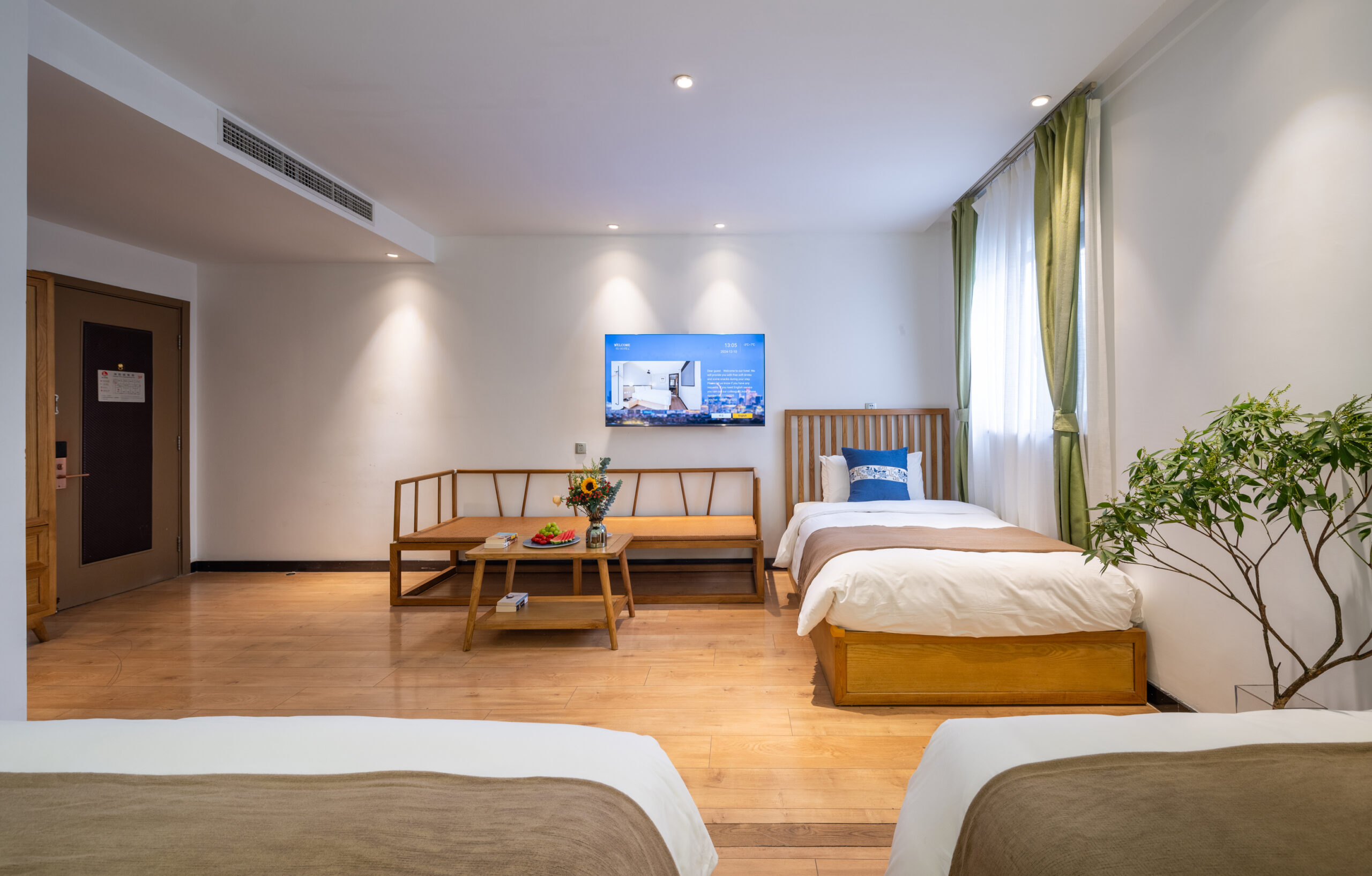 Chinese Classic Family Quadruple Room with One Double Bed and Two Single Beds - Image 4